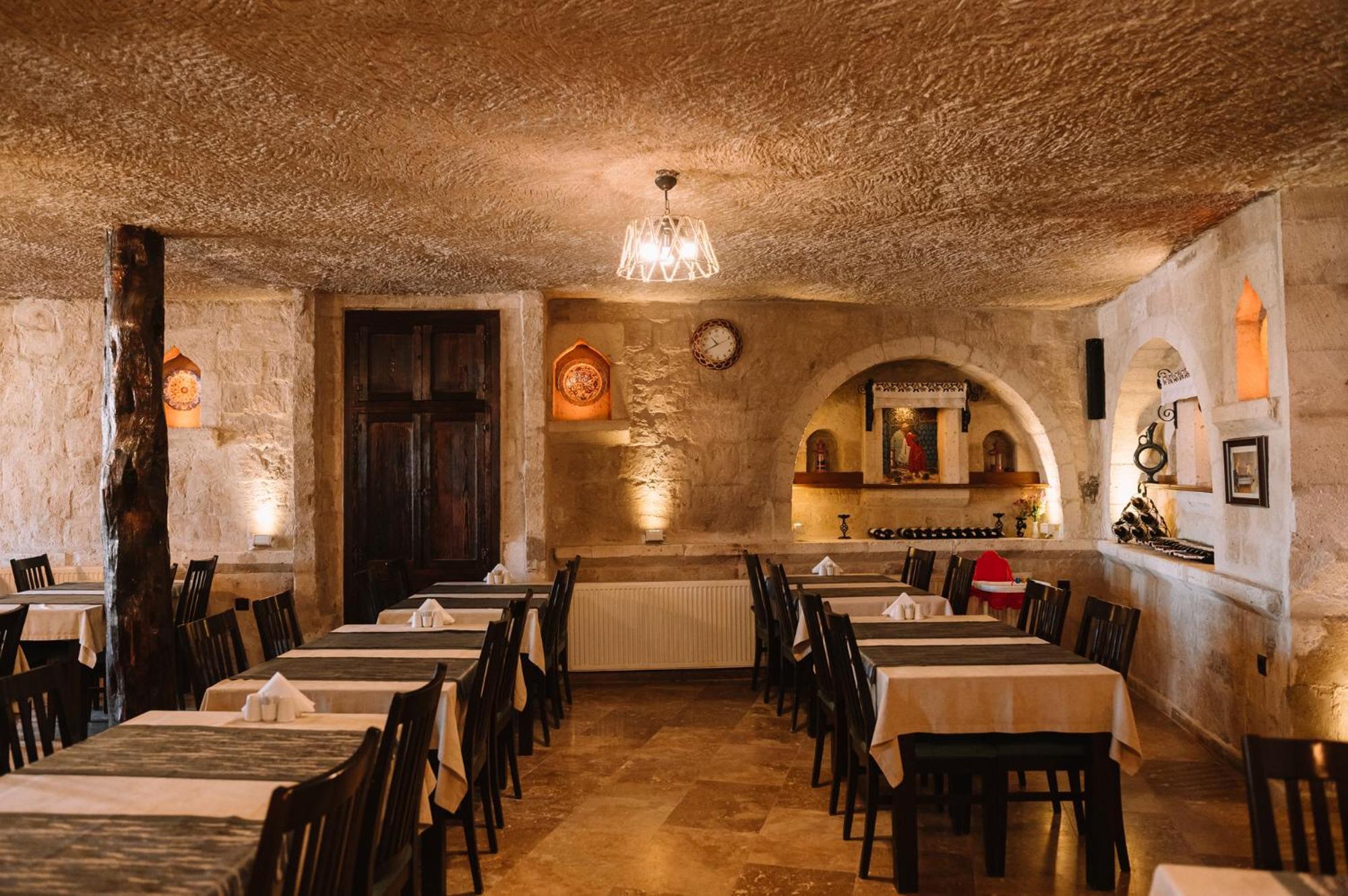 גורמה Cappadocia Cave Suites Adult Only מראה חיצוני תמונה